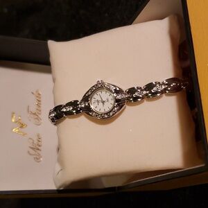 New silver tone watch